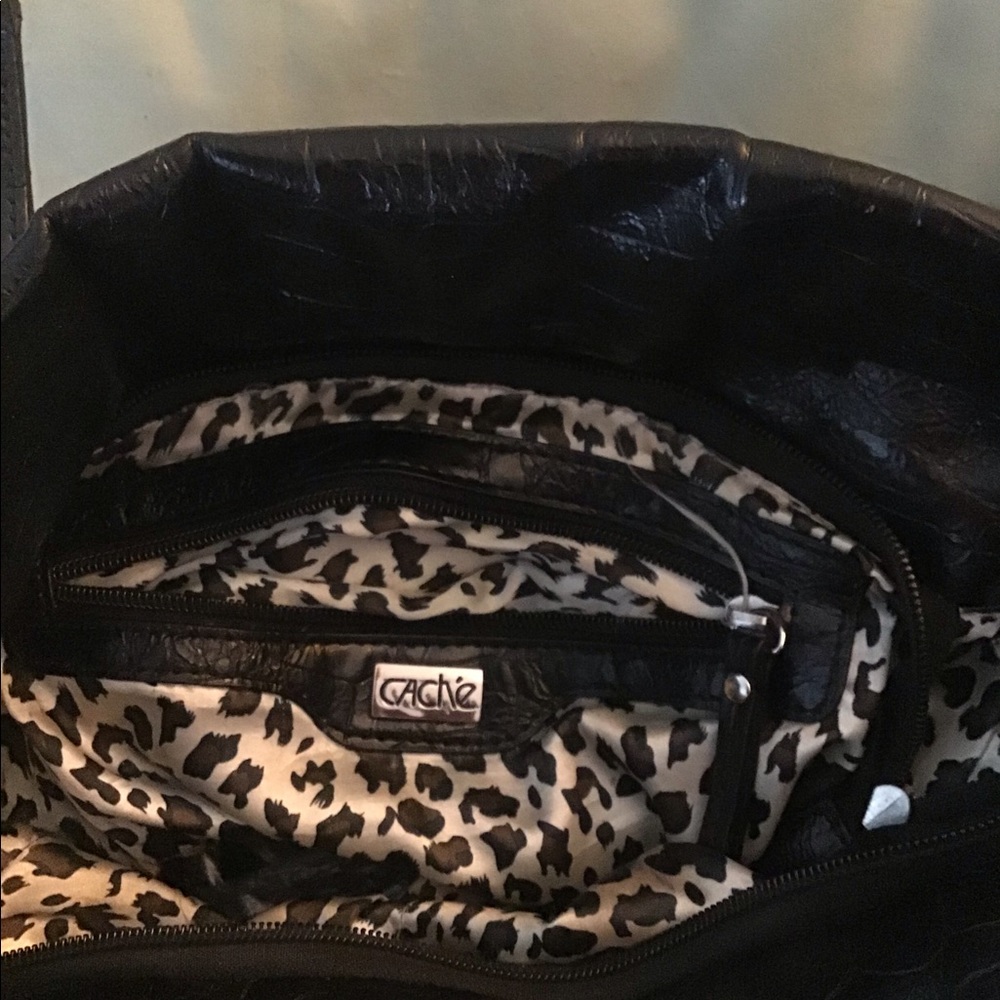 Cache purse with metal accents